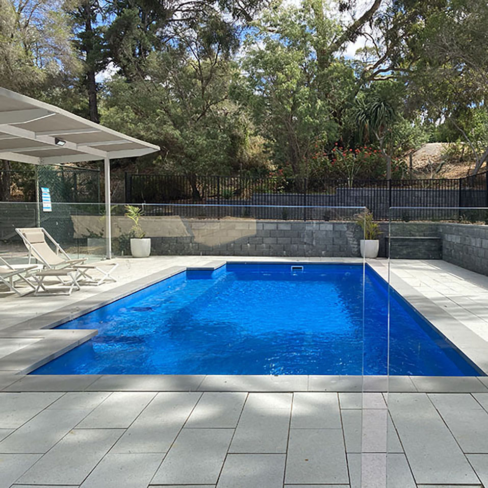 After Stoneware Mist pool paving and Retaining Walls